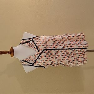 Sleeveless Anthropologie blouse with pineapple print